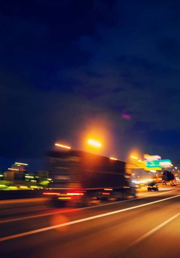 Semi truck at night speeding